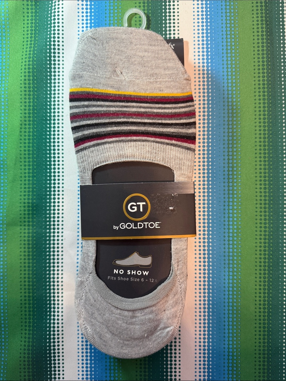Goldtoe GT Men’s No-Show Socks in Light Gray with Stripes and other colors.